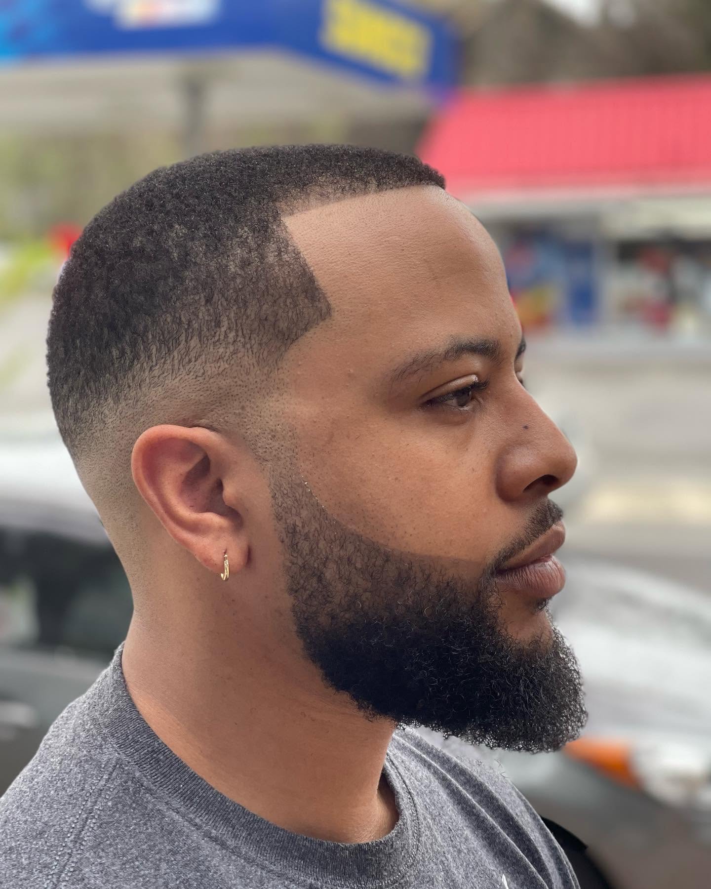 Proud Pops close-profile beard shaping and grooming detail